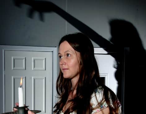 Sarah Boulter appearing in Nightmare; Fright of Your Life at the Royalty Theatre in 2011. 
The theatre stage is said to be haunted.