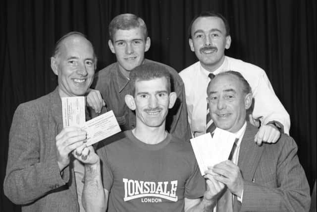 Billy Hardy with some of the winners who got tickets for his fight at Crowtree.