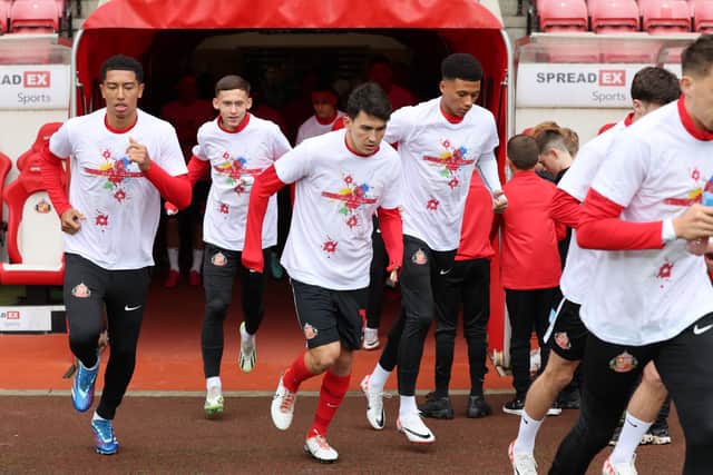 SAFC players running out at the Stadium of Light in the winning T-shirt design.