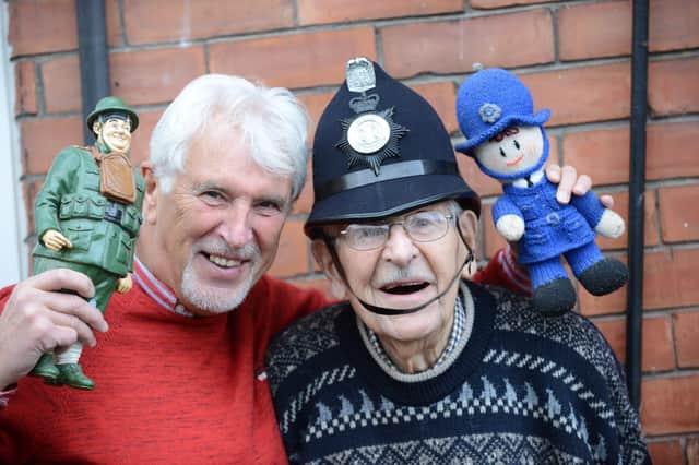 Former police officer and childrens entertainer Bill Ford, with his son George.