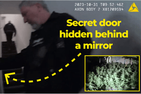 Police officers discover the secret room.