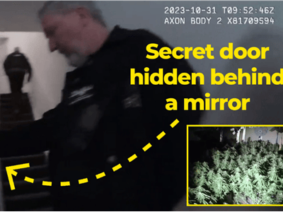Police officers discover the secret room.