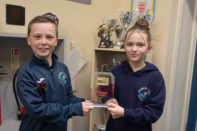 Pupils at Seaburn Dene Primary School holding the Sunderland Active Gold Award.