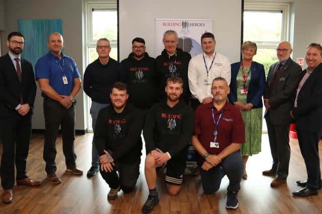 Building a bright future, current and former service personnel who have been learning
new trades at Darlington College thanks to the charity Building Heroes. Submitted picture.