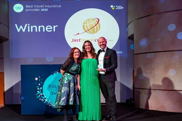Lucy Porter presents the award to Sarah Forster and Dale Robinson from Just Travel Cover. Submitted picture.