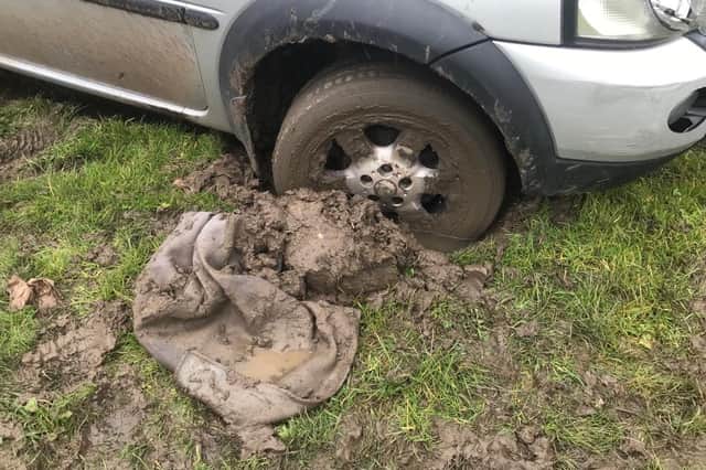 Land Rover gets stuck in the mud after heavy rain hits Sunderland