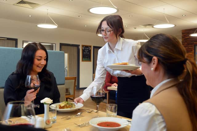 Inside Sunderland College City Bistro with restaurant manager student Carla Woods.