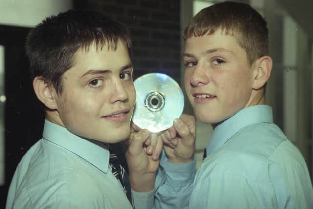 Castle View School duo Orion, alias Steven Dorward, left, and David Cuthbertson, with the CD single Amazing World.