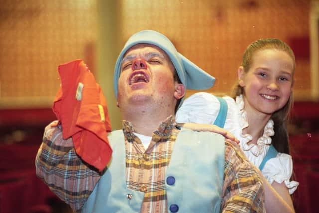 Sneezy the dwarf, alias actor David Davies, with Pallion schoolgirl Elizabeth Hope-Hindmarsh.