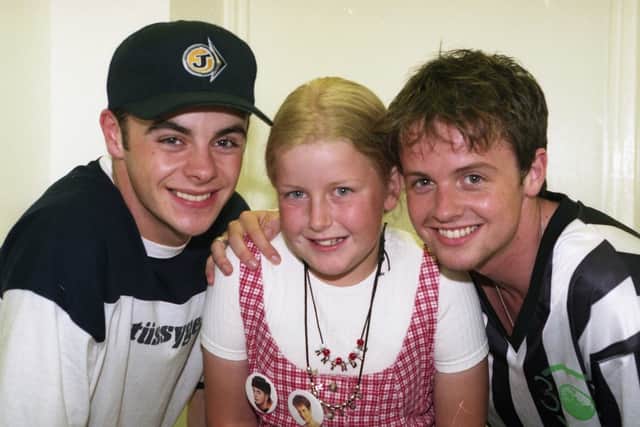 Echo competition winner Kayleigh Lindstedt with pop idols PJ and Duncan. 
The duo played at Sunderland Empire Theatre in July 1995.