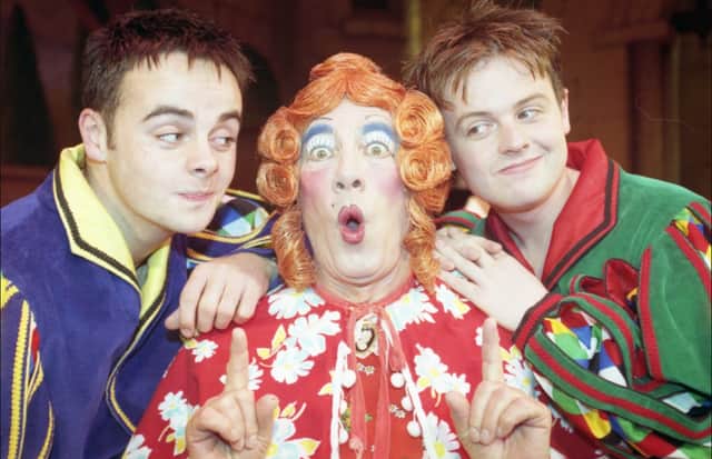 Ant and Dec with Dame Dolly, played by Peter Thorne, during the Empire's panto of Snow White in December 1998.