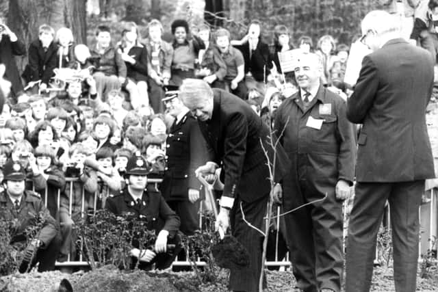 President Carter planting a tree at Washington Old Hall in 1977, with Prime Minister James Callaghan looking on.