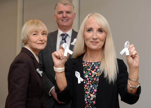 Sunderland City Council Cllr Kelly Chequer, Director of Public Health Gerry Taylor, and Chief Executive Patrick Melia, supporting White Ribbon Day. Picture by SCC.