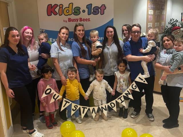 Staff and children at Kids 1st nursery celebrate their outstanding Ofsted judgement.