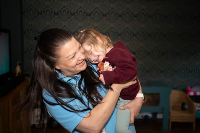 Beatrix with Family Support Worker Monica. Photo: Drew Cox.