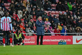 Sunderland boss Tony Mowbray watches on