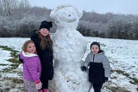 Robyn Brown, Nate Brown and Evie Botcherby with Sunny the snowman at Herrington Country Park. Picture sent in by Emma Louise Brown.