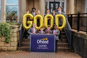 Children from Christ's College celebrating the school's good Ofsted report.