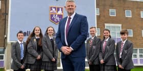 Monkwearmouth Academy executive headteacher Mike Collier celebrates the school's good Ofsted with pupils. 