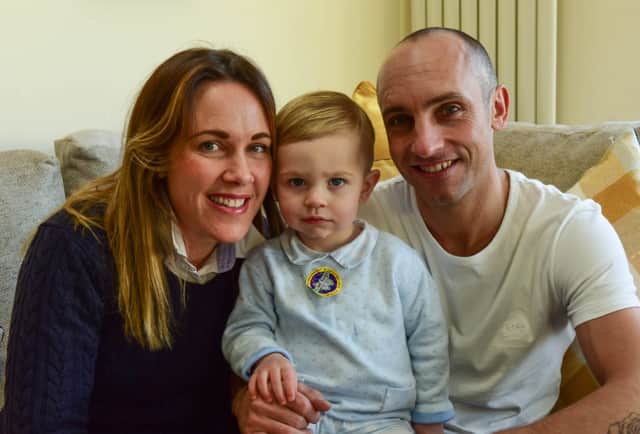 Gray with mum Danielle and dad Kris in 2018 - the year he won the Echo's Child of Courage Award.