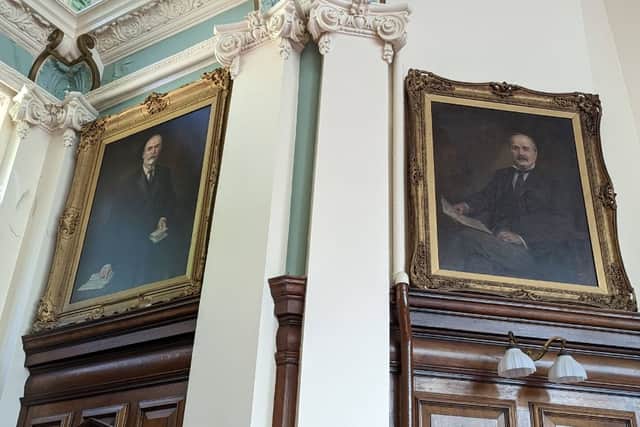 The portraits at the front of the pitman’s parliament.