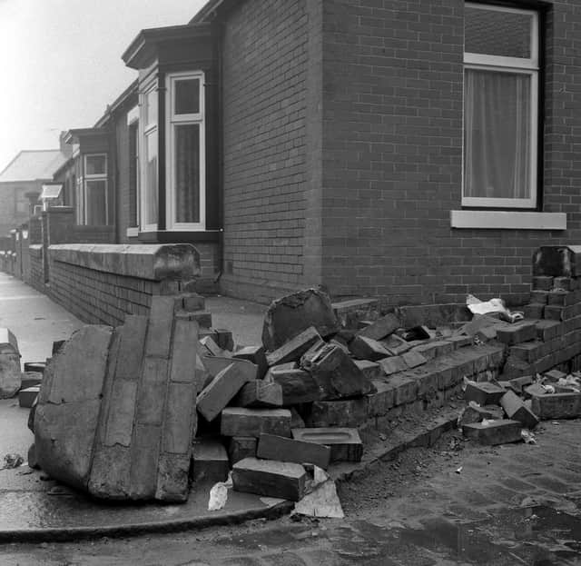 The aftermath of the night with damage in the streets around Roker Park.