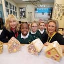 Bellway Sales Advisor Barbara Kettlewell, Year 1 Teacher Lynsey Pearce, and osme of the KS1 students at St Patrick’s RC Primary School, Ryhope 
