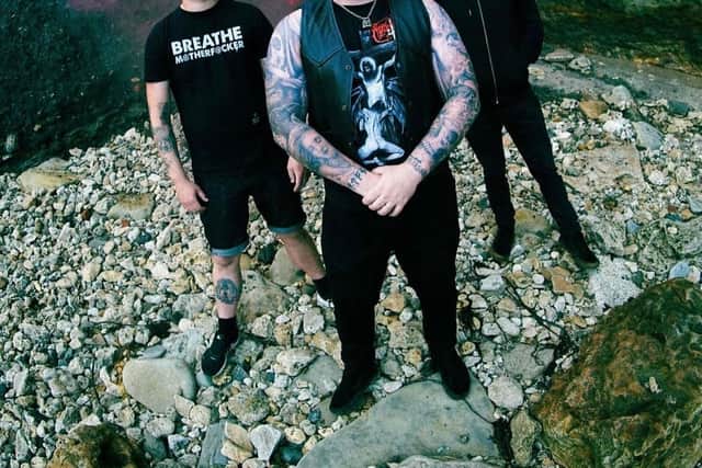 Yersin, from left, singer Chris storey, guitarist Rob Scott and drummer Chris Mallan.