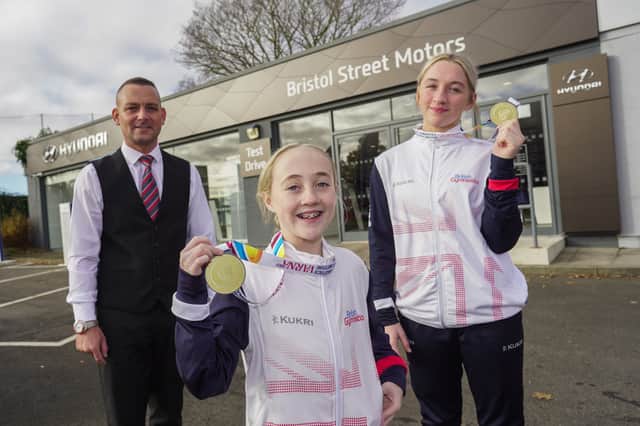Craig Smith, branch manager at Bristol Street Motors Sunderland Hyundai, with Keira and Jessicca. Submitted picture.