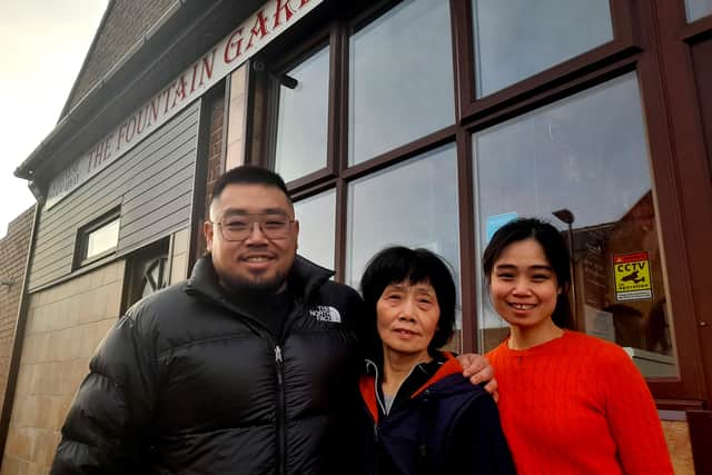 The Ng family are saying goodbye to the Fountain Garden and its customers after 30 years. Peng Ng is seen with daughter Julie and son Nigel.