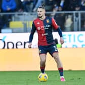 Genoa defender Radu Dragusin