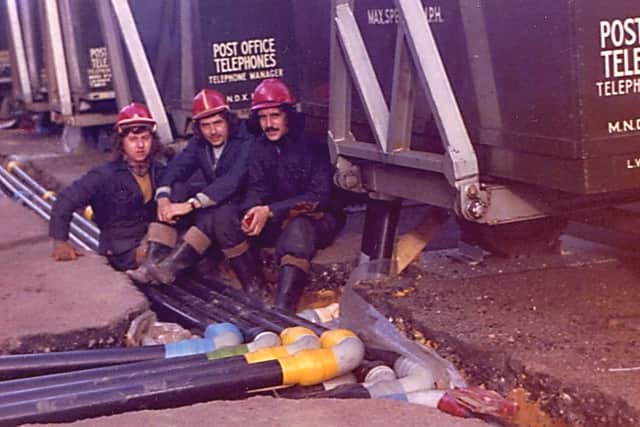 Workers at the scene in 1974 with Ron Lawson, centre.