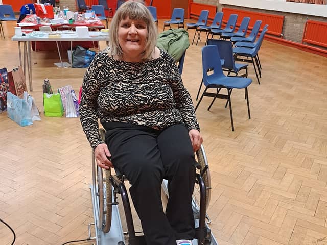 Judith Hudson on the new wheelchair scales.