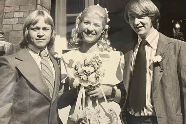 Robert Hughes, wife Christine and his brother John on the couple's wedding day. Submitted picture.