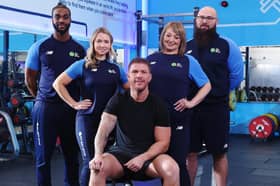 SAS Who Dares Wins star Chris Oliver with members of The Gym Group team.