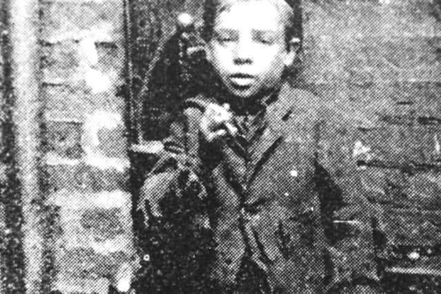 An East End boy in the late 19th century.