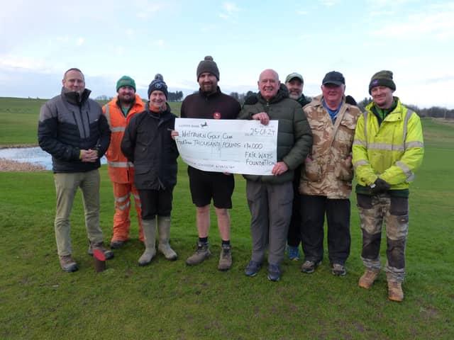 Whitburn club officials and volunteers with course architect Jonathan Gaunt and course constructor Charlie Greasley at the handing over over of a cheque for £14,000 from the FairWay Foundation 