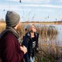 Visitors getting back to nature and enjoying the reeds and wetlands.