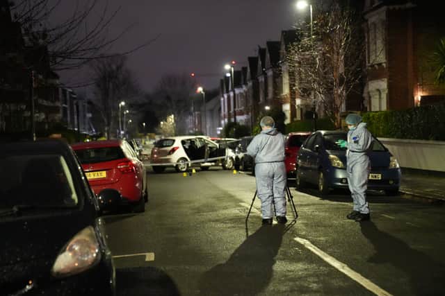 Police at the scene in Lessar Avenue near Clapham Common, south London.