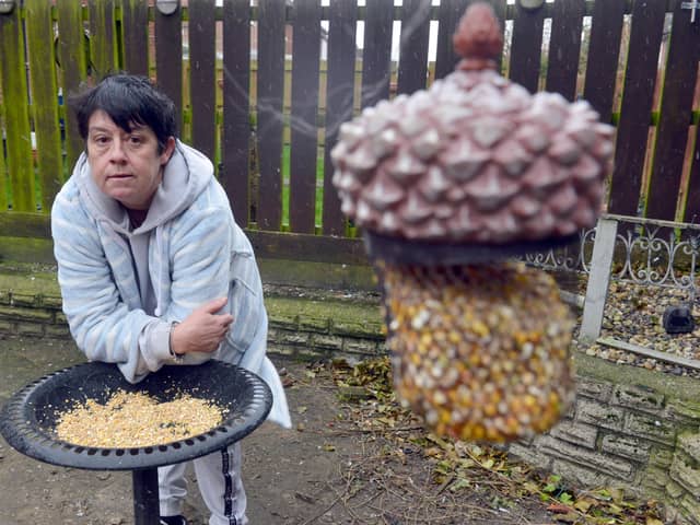 Tracy O'Neill has been in dispute with her neighbours over feeding birds in her garden.