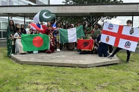 Thornhill Academy pupils and staff celebrate receiving the International School Award.