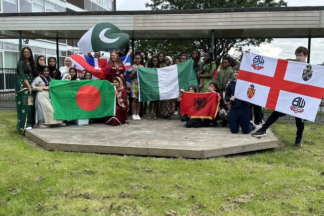 Thornhill Academy pupils and staff celebrate receiving the International School Award.