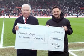 Bob Murray presents Foundation of Light, MD Jamie Wright with a cheque for £100,000 at the Stadium of Light.