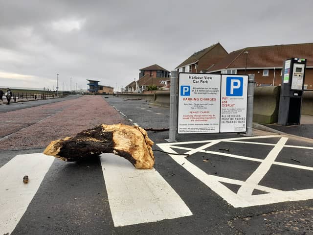Harbour View Car Park had to close to clear dangerous debris thrown by the sea.