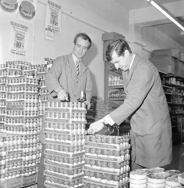 Marking up the stock at Hintons with decimal prices in 1971.