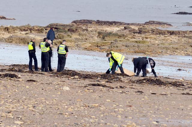 Police searching Roker beach in February.