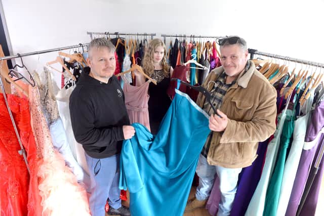 Building Blocks Day Centre owner Lee Nicholson and John Helm with youngster Poppy Heels, 15, in her prom dress.