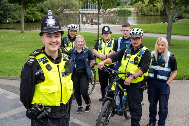 Sgt Tom Scott with neighbourhood officers and council wardens in Mowbray Park