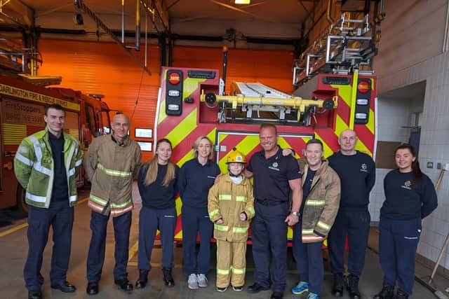 Blaine with firefighters from Peterlee