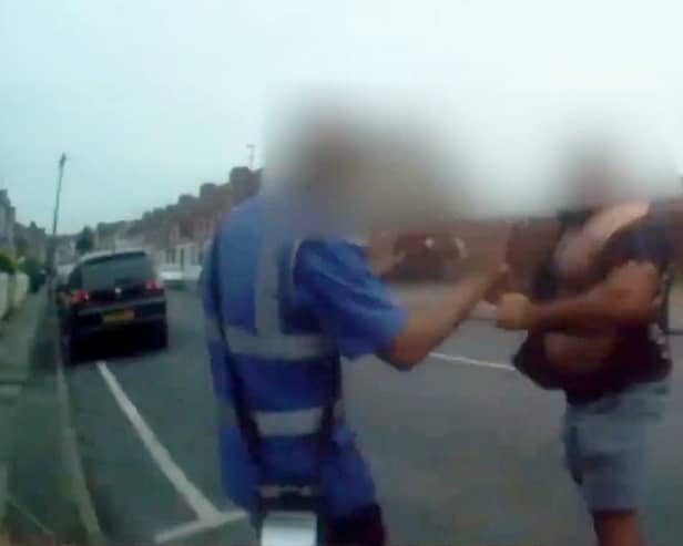 Shocking footage from a bodycam captured the moment a raging van driver threw a traffic warden to the ground after he ticketed his illegally parked van. Picture: Coventry City Council / SWNS